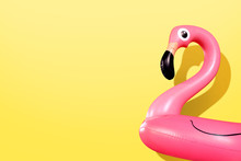 Giant Inflatable Flamingo On A Yellow Background, Pool Float Party, Trendy Summer Concept