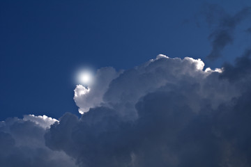 blue sky with clouds and sun,nature,white,weather,cloudscape,light,fluffy,sunlight,air,blue