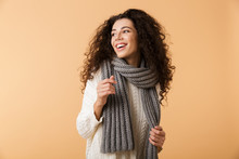 Cheerful Young Woman Wearing Winter Scarf