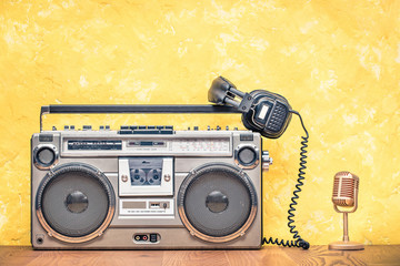 Wall Mural - retro outdated portable stereo boombox radio cassette recorder from circa late 70s, golden microphon