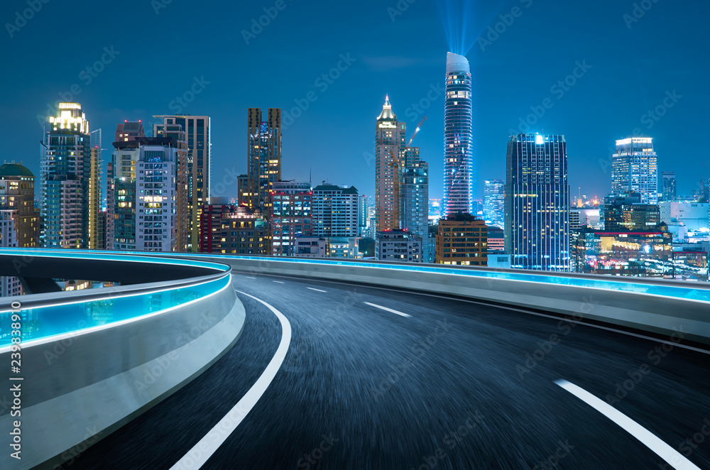 Curvy flyover highway moving forward road with Bangkok cityscape night scene view . motion blur effect apply - obrazy, fototapety, plakaty 