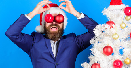 Poster - Businessman join christmas preparation. Christmas fun. Business and christmas concept. Santa hold christmas ball decoration. Holidays meant for fun. Man bearded hipster wear formal suit and santa hat