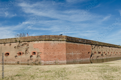 Fotografie, Obraz Bullet holes / cannon holes in the brick walls of Fort Pulaski National Monument