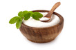 Stevia rebaudiana, sweet leaf sugar substitute isolated in wooden bowl on white background
