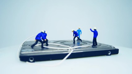 Poster - miniature figure footage with theme of maintenance server