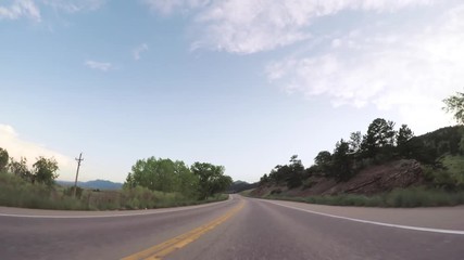 Fotobehang - Driving on paved road in Boulder area.