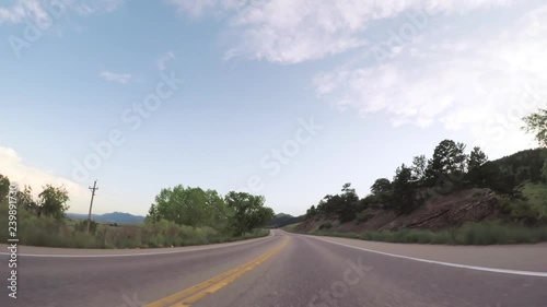 Fototapete - Driving on paved road in Boulder area.