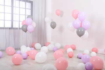 Poster - Room decorated with colorful balloons near wall