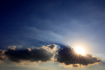 Poster - The sun and dark clouds