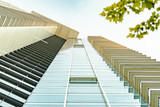 Fototapeta  - Modern architecture commercial building, concrete and glass walls.