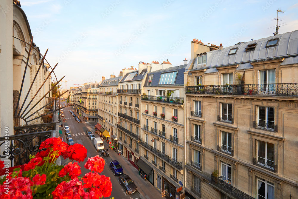 Paris, ancient buildings facades and street in a warm summer sunset in France - obrazy, fototapety, plakaty 