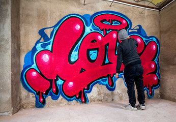 graffiti of word love on a wall