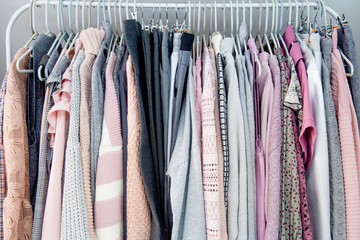 Fashion winter coats hanged on a clothes rack