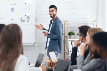 CEO having business meeting with his staff