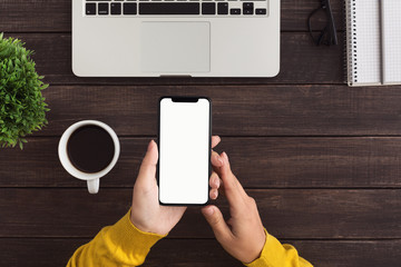 Poster - Designer working with blank smartphone in office