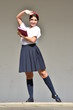 © dtiberio - Cute Colombian Student Teenager School Girl Bright Sunlight Wearing Skirt