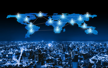 Poster - World map pin flat of city, global business and network connection lines in futuristic technology concept in smart urban city in Asia. Skyscraper and high-rise buildings at night in Bangkok, Thailand