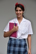 © dtiberio - Portrait Of A Girl Student Wearing School Uniform With Notebook