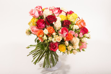 Bouquet of assorted multicolored roses isolated on white background