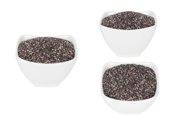 Wall Mural - set chia seeds in a white ceramic plate, isolated