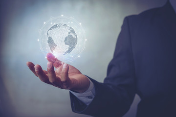 Poster - business man hand with virtual screen World map , network connection, international meaning,Technologies connecting the world copy space
