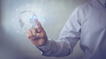 Poster - Businessman hand touching map point, network connection, international meaning, copy space