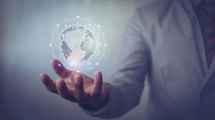 Poster - business man hand with virtual screen World map , network connection, international meaning,Technologies connecting the world copy space