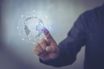 Poster - Businessman hand touching map point, network connection, international meaning, copy space