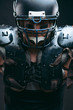 © alfa27 - Portrait of sexy american football player wearing protective armour on shirtless torso, looking confidently, ready to tear apart everybody who bothers to win, isolated over dark studio background.