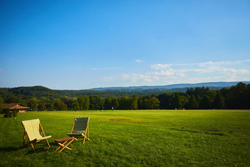 Relax with wooden chair and table. Enjoy the view of garden forest