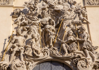 Wall Mural - PRAGUE, CZECH REPUBLIC - OCTOBER 18, 2018: Baroque relief of apostle St. James the Grater over the main entry  of  Bazilika Svatého Jakuba Většího (James the Greater) by Ottavio Mosto (1695 -1701).