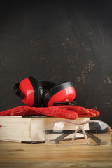 Wall Mural - Safety Personal Protective Equipment(PPE) on a rustic black background.