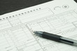 © sunftaka77 - 年末調整の申告書とボールペン
