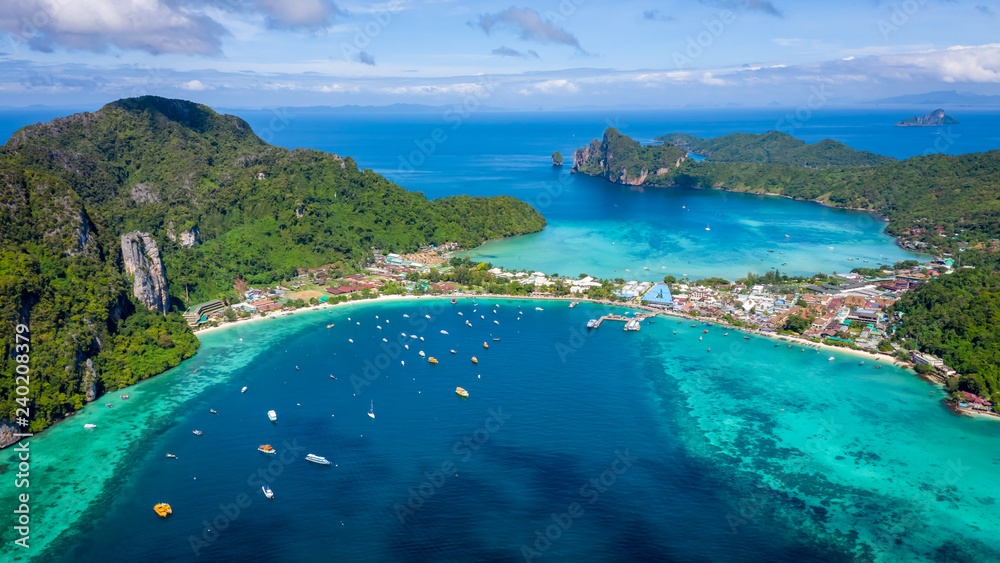 hi season boat and tourists on phiphi island Krabi Thailand aerial view from drone - obrazy, fototapety, plakaty 