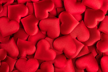 Valentine's Day. Red Heart Shape Backdrop. Abstract Holiday Valentine Background With Red Satin Hearts. Love Concept