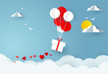Love And Valentine Day. Balloons Carries Gift Box And Hearts On Sky