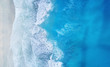 Beach and waves from top view. Turquoise water background from top view. Summer seascape from air. Top view from drone. Travel concept and idea