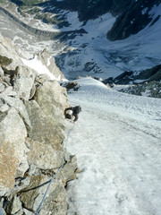 Canvas Print - mountain climber on a steep climbing route in the French Alps in Chamonix