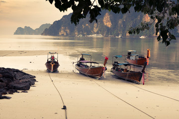 Long tail boats under blue sky in Krabi, Thailand