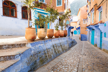 six vases on the street in blue city Chefchaouen in Morocco