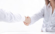 © yurolaitsalbert - background image of handshake of business partners.close up
