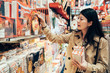 © PR Image Factory - asian girl traveler visiting local specialty shop