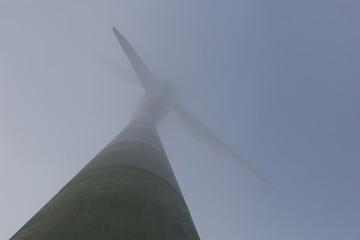 Wind turbine in the fog