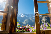 Alps In Summer Morning. Gimmelwald, Lauterbrunnen, Switzerland, Alps Mountain Landscape Through The Window. Europe Swiss.