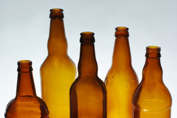 Beer bottles on light