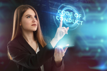 The concept of business, technology, the Internet and the network. A young entrepreneur working on a virtual screen of the future and sees the inscription: Code of conduct