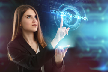 The concept of business, technology, the Internet and the network. A young entrepreneur working on a virtual screen of the future and sees the inscription: Cryptocurrency