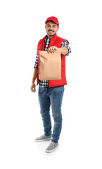 Sticker - Young courier with paper bag on white background. Food delivery service