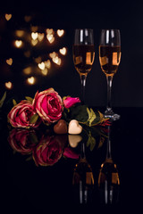 Wall Mural - Two glasses of champagne, roses and heart shape chocolates