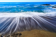 Retreating Waves Along The Coast